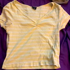 Yellow cropped shirt